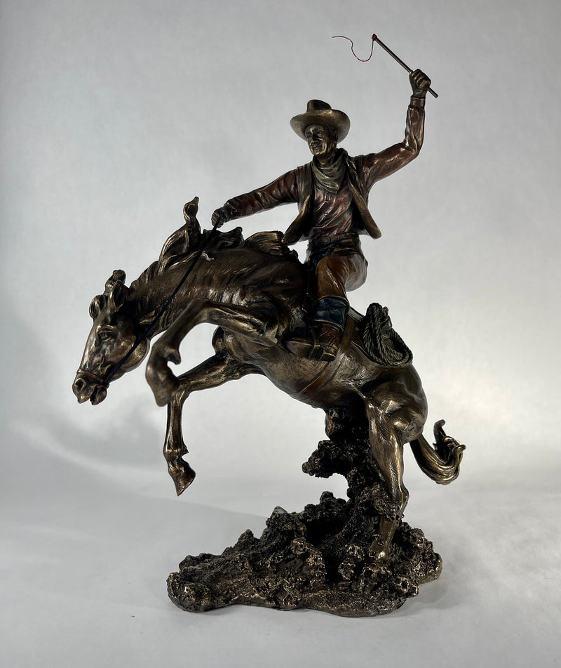 Bucking Bronco with Cowboy Statue