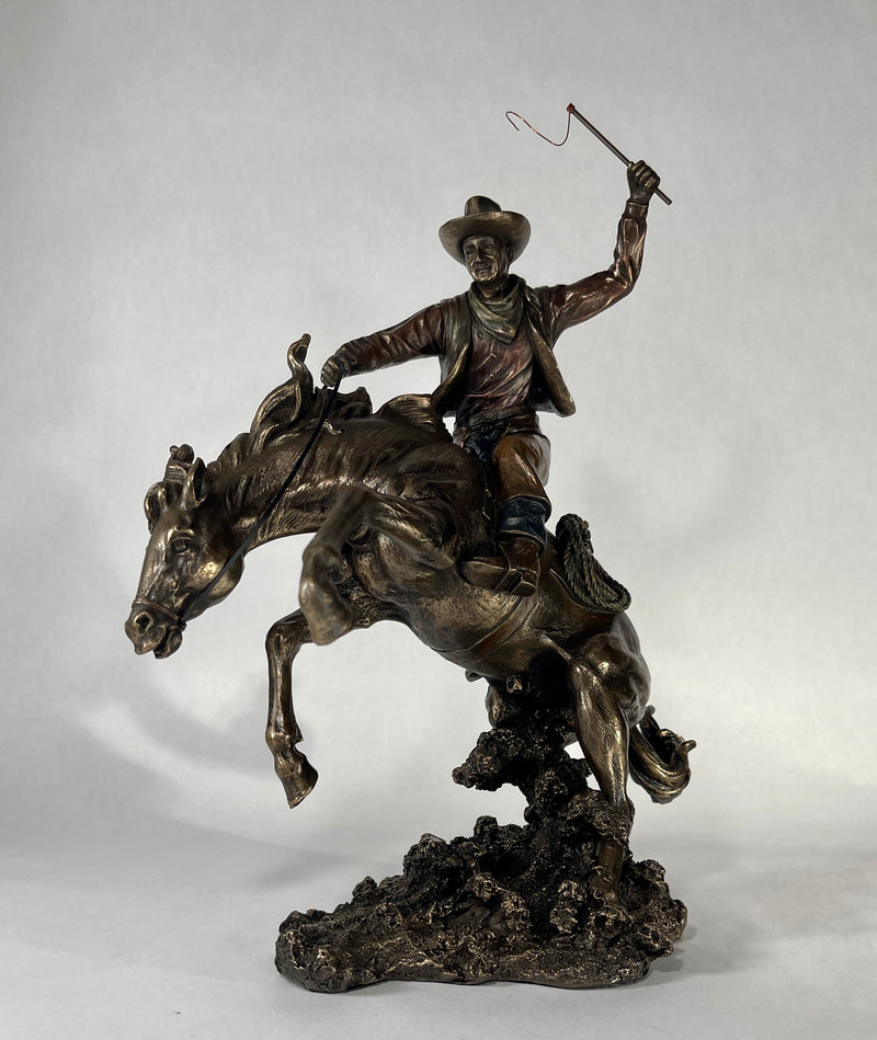 Bucking Bronco with Cowboy Statue
