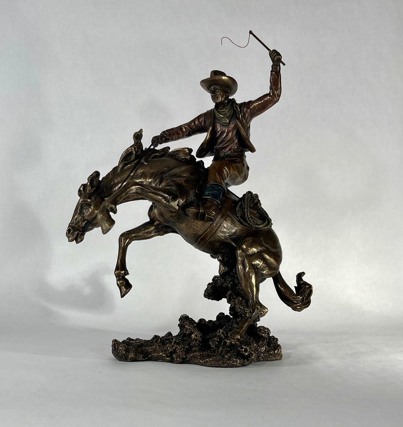 Bucking Bronco with Cowboy Statue