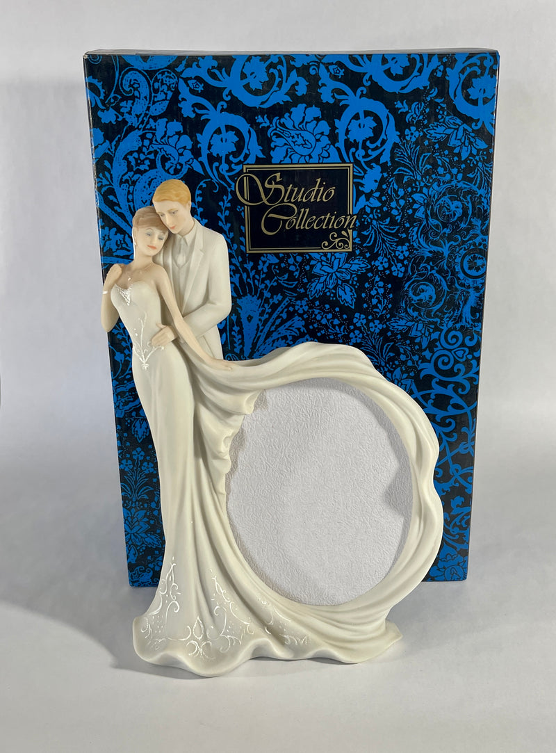 wedding couple statue with picture frame