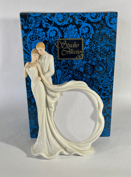 wedding couple statue with picture frame
