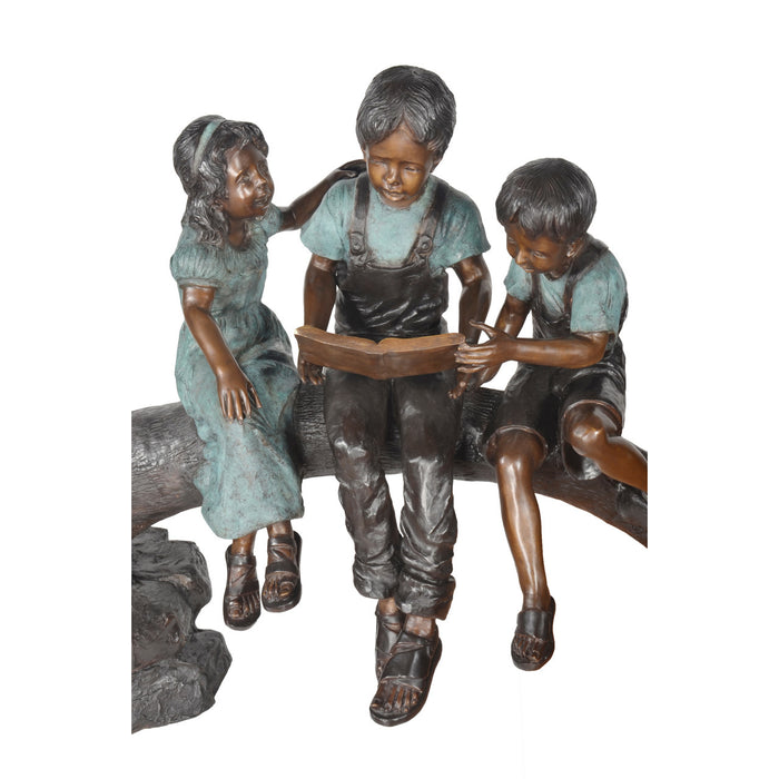 Three Kids Reading Book on Log Bronze Sculpture